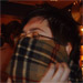 Ali, wearing a scarf...around her face.